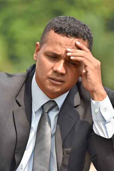 Thoughtful Business Man Wearing Suit And Tie