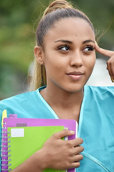 Teen Hispanic Female Nursing Student Thinking