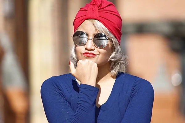 Thoughtful Young Diverse Muslim Woman Wearing Turban