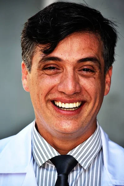 Smiling Diverse Male Doctor Wearing Lab Coat with Tablet — Stok Foto