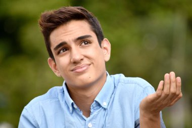 Confused Latino Teenage Boy clipart
