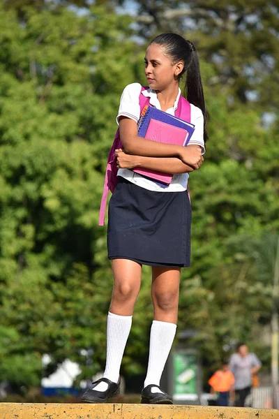 Latina Girl Student With Ponytail Wearing School Uniform