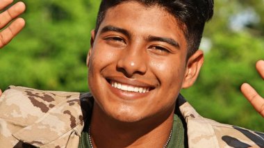 Hispanic Male Soldier And Happiness clipart