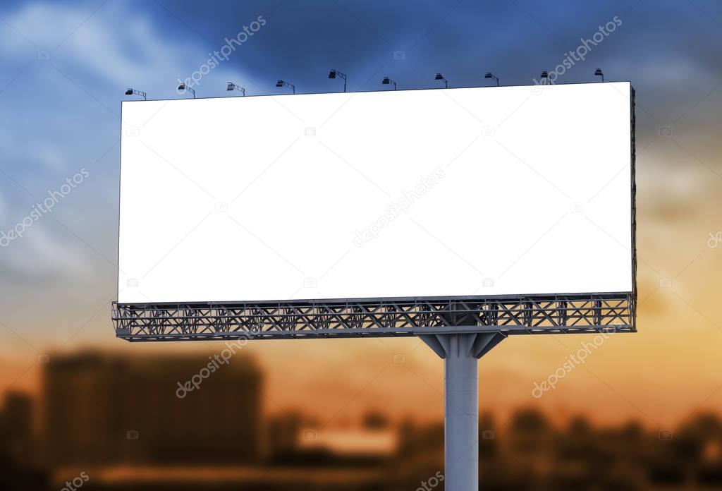 Blank billboard at twilight