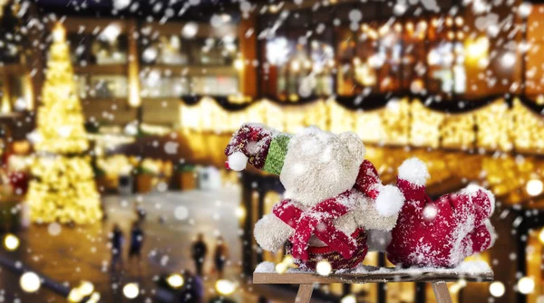 Couple teddy bear looking to light christmas decoration — Stock Photo, Image