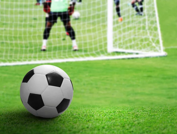 Soccer ball on the soccer field — Stock Photo, Image
