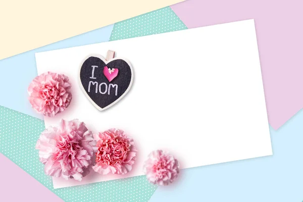 Happy mothers day concept of color paper and pink carnation flowers — Stock Photo, Image