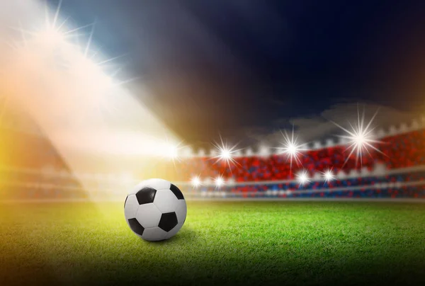 Fotboll på fotbollsarena med ljus — Stockfoto
