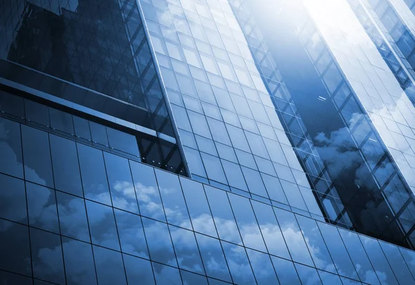 Skyscraper or modern building in the city with cloud and sunligh — Stock Photo, Image