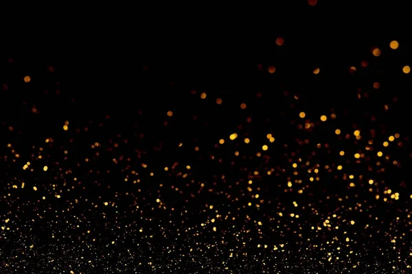 Abstrakter dunkel gefärbter Glitzerhintergrund mit gleißendem Licht und weichem Bokeh, festliche Farben — Stockfoto