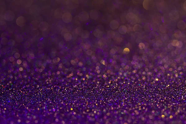 Glitter ve parlaklık çok şaşırtıcı bokeh parlayan renkli. Karanlık soyut rüya gibi wunderful ışıltı arka plan