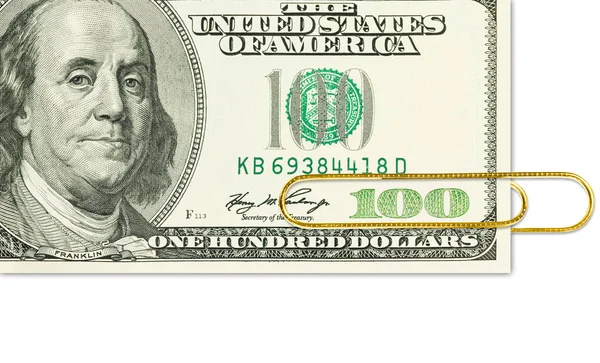 Banknot stu Dolar złoty spinacz do papieru na nim zamknąć u — Zdjęcie stockowe