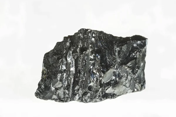 Black coal mine close-up with large depth of field. Anthracite coal bar isolated on white background — Stock Photo, Image