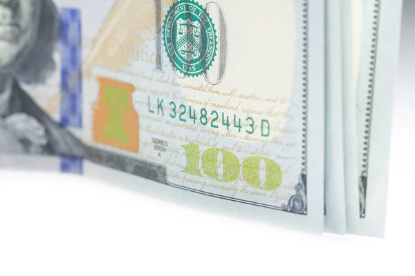 One hundred dollars and coin stack close up with selective focus — Stock Photo, Image