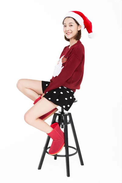 Woman Santa Hat Sitting Stool — Stock Photo, Image