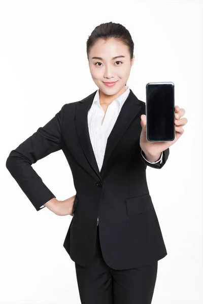 Pretty Chinese Girl Wearing Black Suit Holding Mobile Phone — Stock Photo, Image