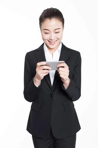 Pretty Chinese Girl Wearing Black Suit Holding Mobile Phone — Stock Photo, Image