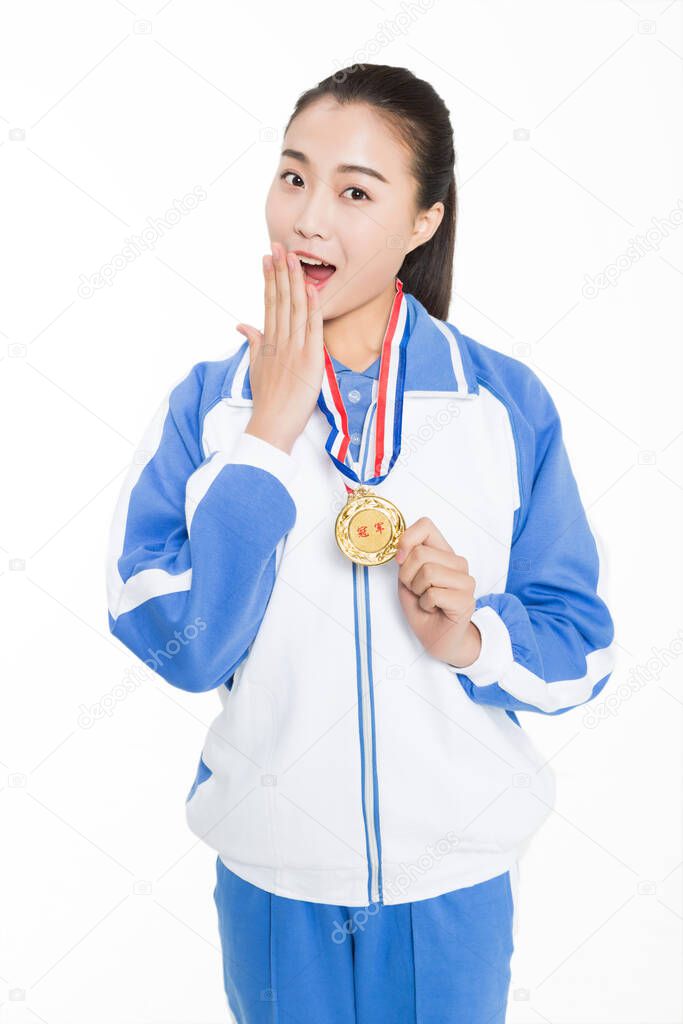 cute female student holding a medal  happy smile