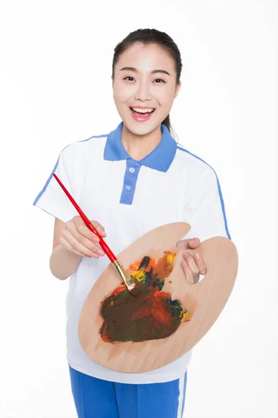 Ragazza Che Indossa Uniforme Maniche Corte Tenendo Una Tavolozza Vernice — Foto Stock