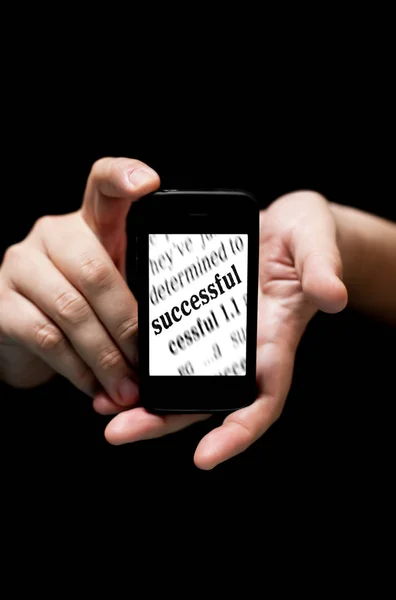 Manos sosteniendo Smartphone, mostrando la palabra éxito impreso — Foto de Stock