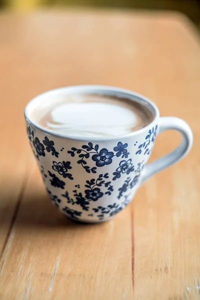 Cup of Hot Coffee served on wooden table — Stock Photo, Image