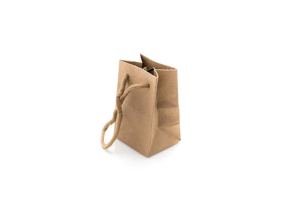 Miniatur-Einkaufstasche aus Papier, auf weißem Hintergrund, Conce — Stockfoto