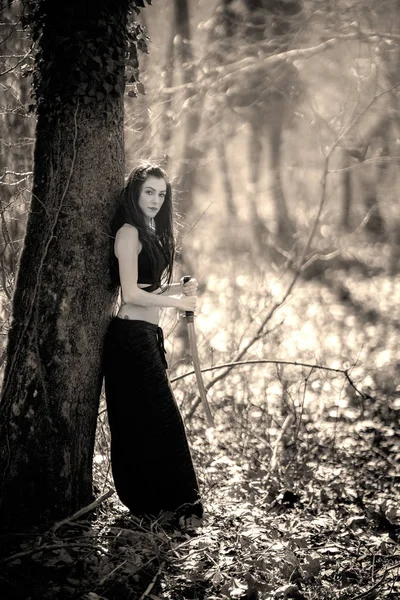 Mythical Creature Woman, Holding her Sword by a Tree in the Fore — Stock Photo, Image