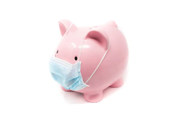 Ameliyat maskesi takan kumbara, dünya ekonomisinde pandeminin etkisi konsepti