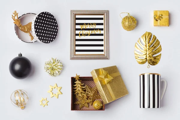 Christmas decorations in black and gold — Stock Photo, Image