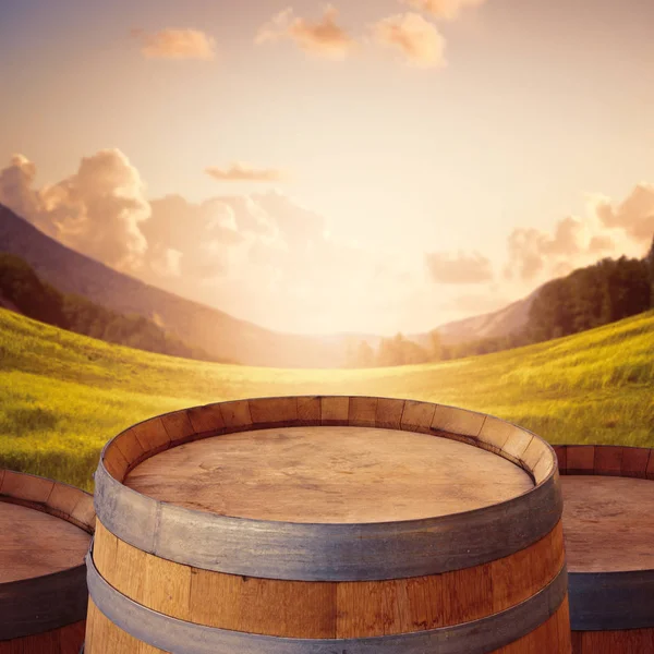 Wooden barrel over beautiful landscape — Stock Photo, Image