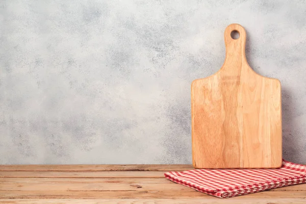 Kitchen background with cutting board — Stock Photo, Image