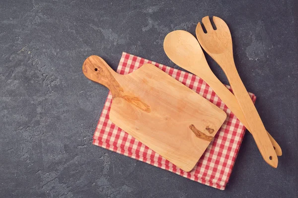 Kitchen background with cutting board — Stock Photo, Image