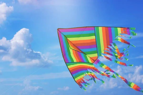 Rainbow kite flying — Stock Photo, Image