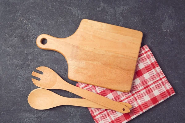 Board, tablecloth and utensils — Stock Photo, Image