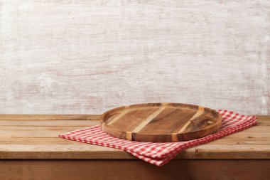 Wooden tray with checked tablecloth  clipart