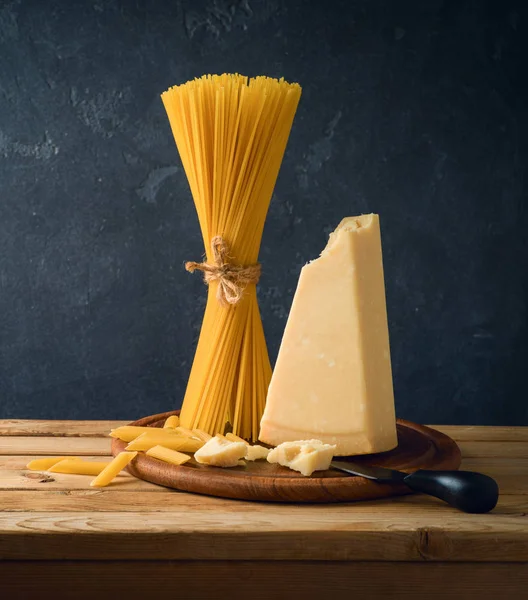 Parmesan cheese, spaghetti and pasta — Stock Photo, Image