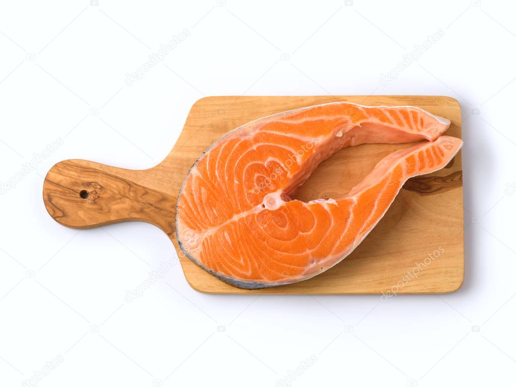 Salmon fish on  cutting board 