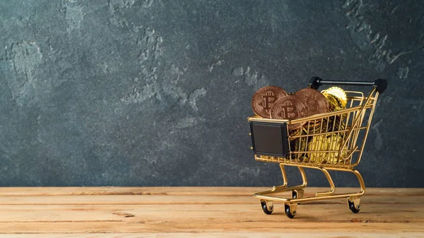 Bitcoins  in shopping cart — Stock Photo, Image