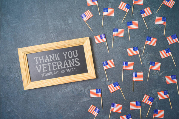 Veterans day background with text and USA flag. Top view from ab