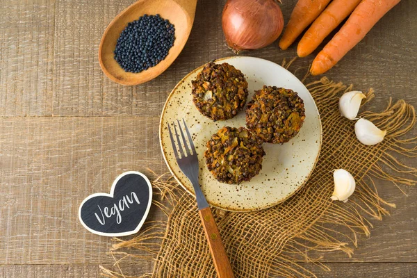 Food and healthy eating concept. Lentils cutlets with carrot and — Stock Photo, Image