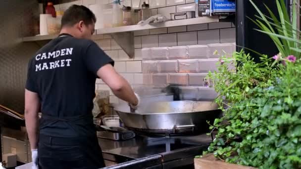 London September 2019 Man Stirs Food Giant Wok Asian Food — Stock Video