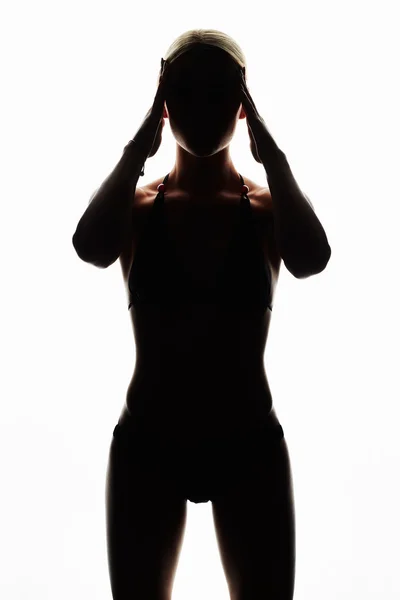 Silhouette féminine sur white.girl avec un corps de sport — Photo