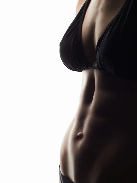 Kvinnliga sport kropp silhouette.young kvinna i bikini.fitness flicka — Stockfoto