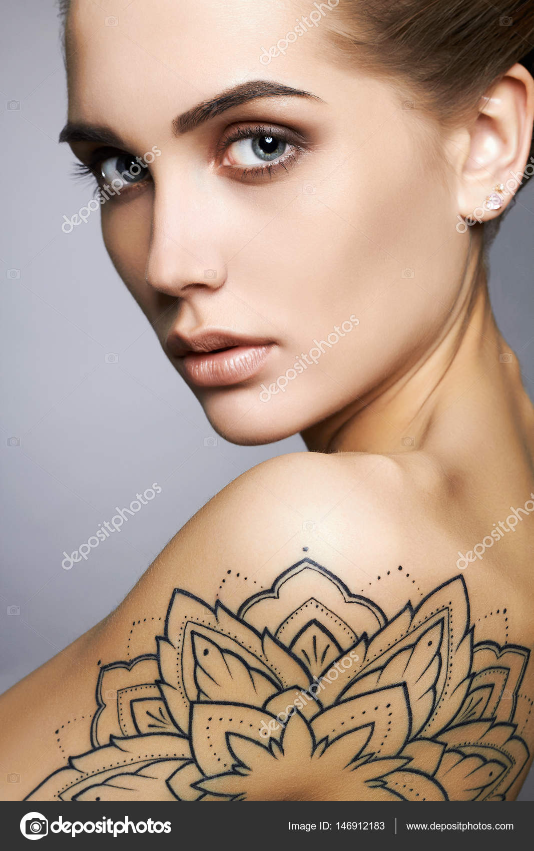 Beautiful sexy woman with tattoo Stock Photo by ©EugenePartyzan 146912183 Beautiful sexy woman with tattoo Stock Photo by ©EugenePartyzan 146912183