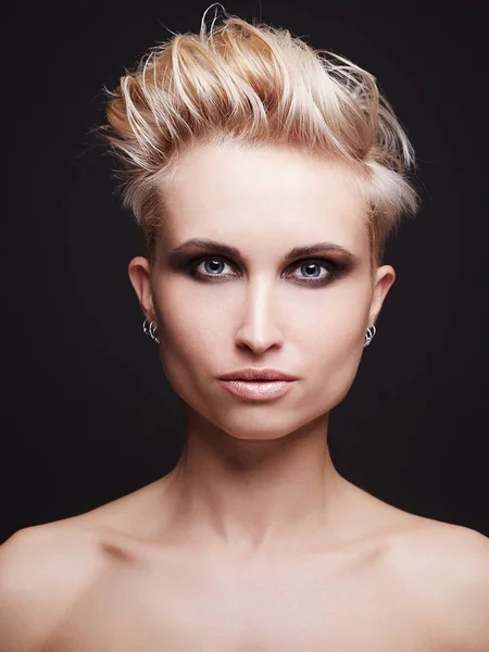 Beautiful young woman with short haircut — Stock Photo, Image