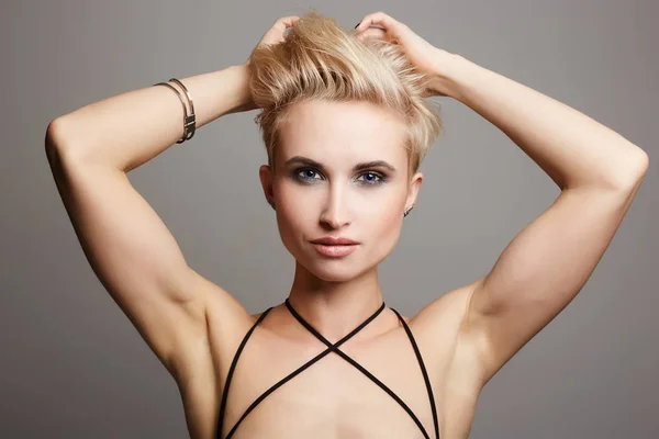 Woman with short hair.strong blonde girl — Stock Photo, Image