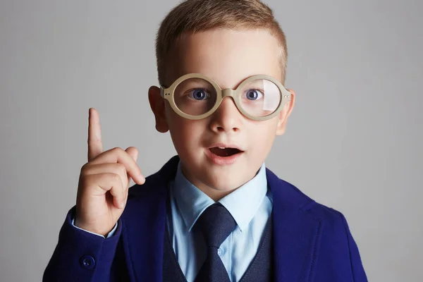 Funny child in glasses and siut — Stock Photo, Image