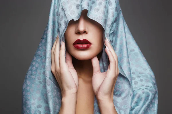 Red lips girl in hood.islamic style woman Stock Photo