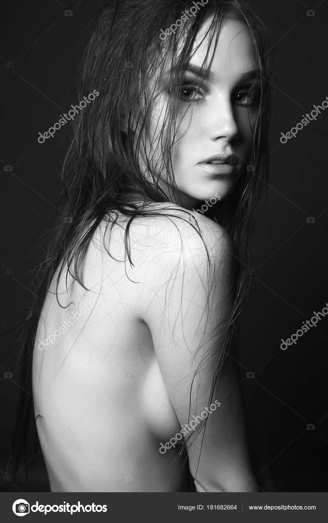 Naked woman with wet hair and body Stock Photo by ©EugenePartyzan 181682664