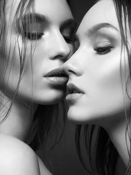 Kiss of couple beautiful young women — Stock Photo, Image